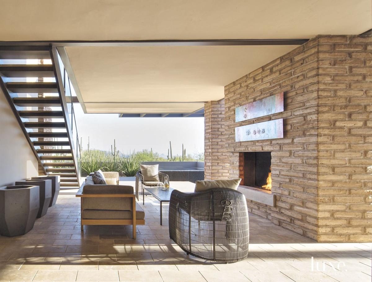 Contemporary Outdoor Living Room with Fireplace | LUXE Interiors + Design