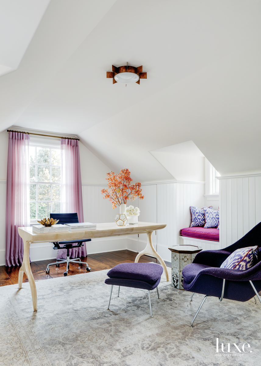 eclectic colorful home office with pink and purple accents