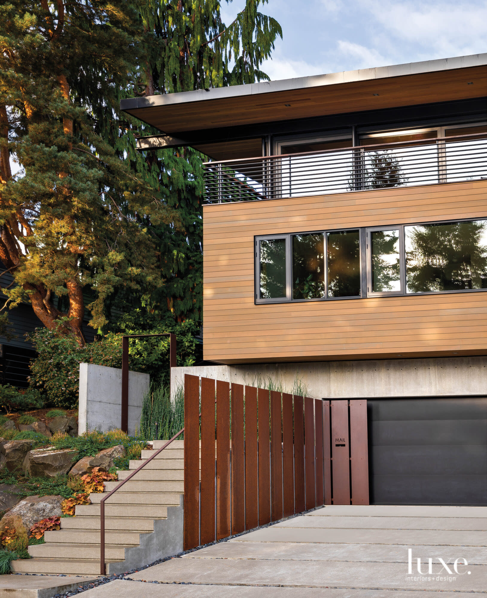 Exterior of Seattle house with stairs leading to front door.