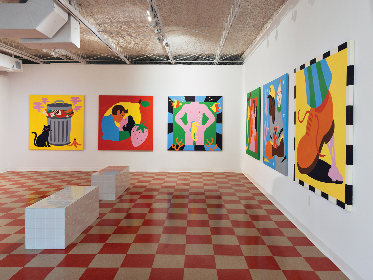 Gallery space featuring red-and-white checkerboard flooring, white benches and vibrant artworks