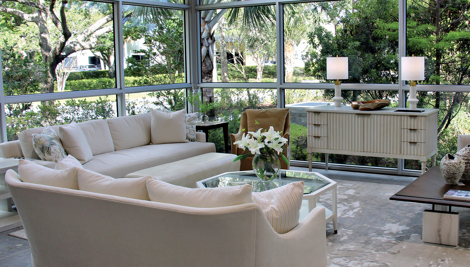 glass-walled living room vignette