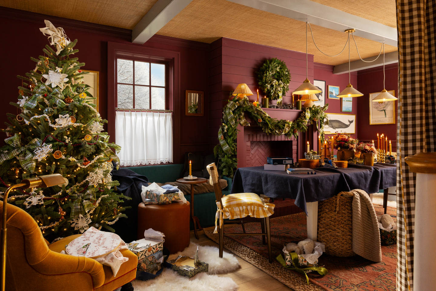 cozy dark red living room with a Christmas tree