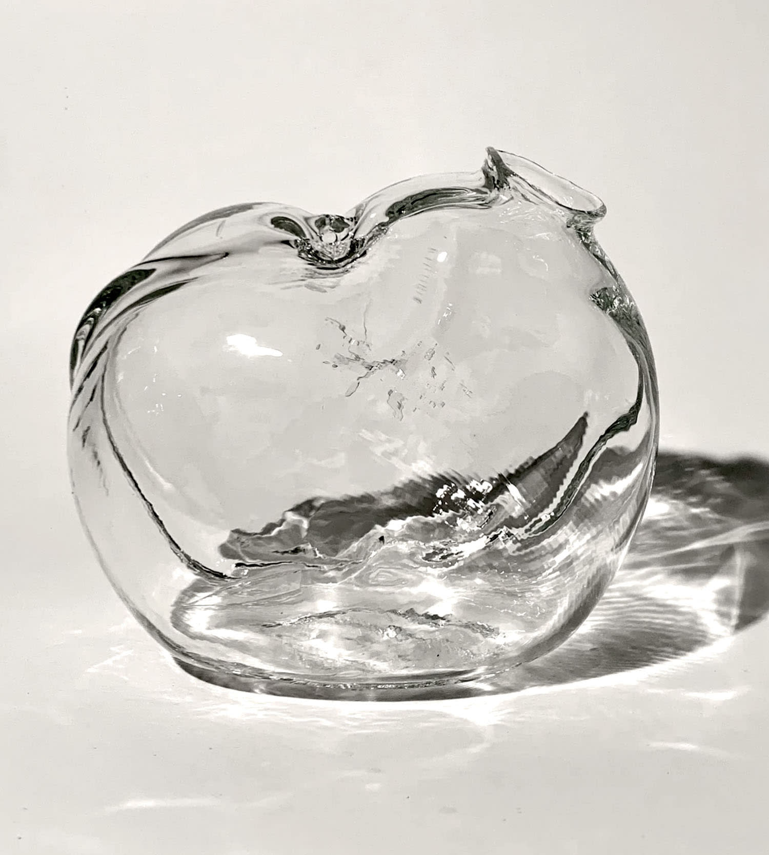 A glass vase with a modular shape.