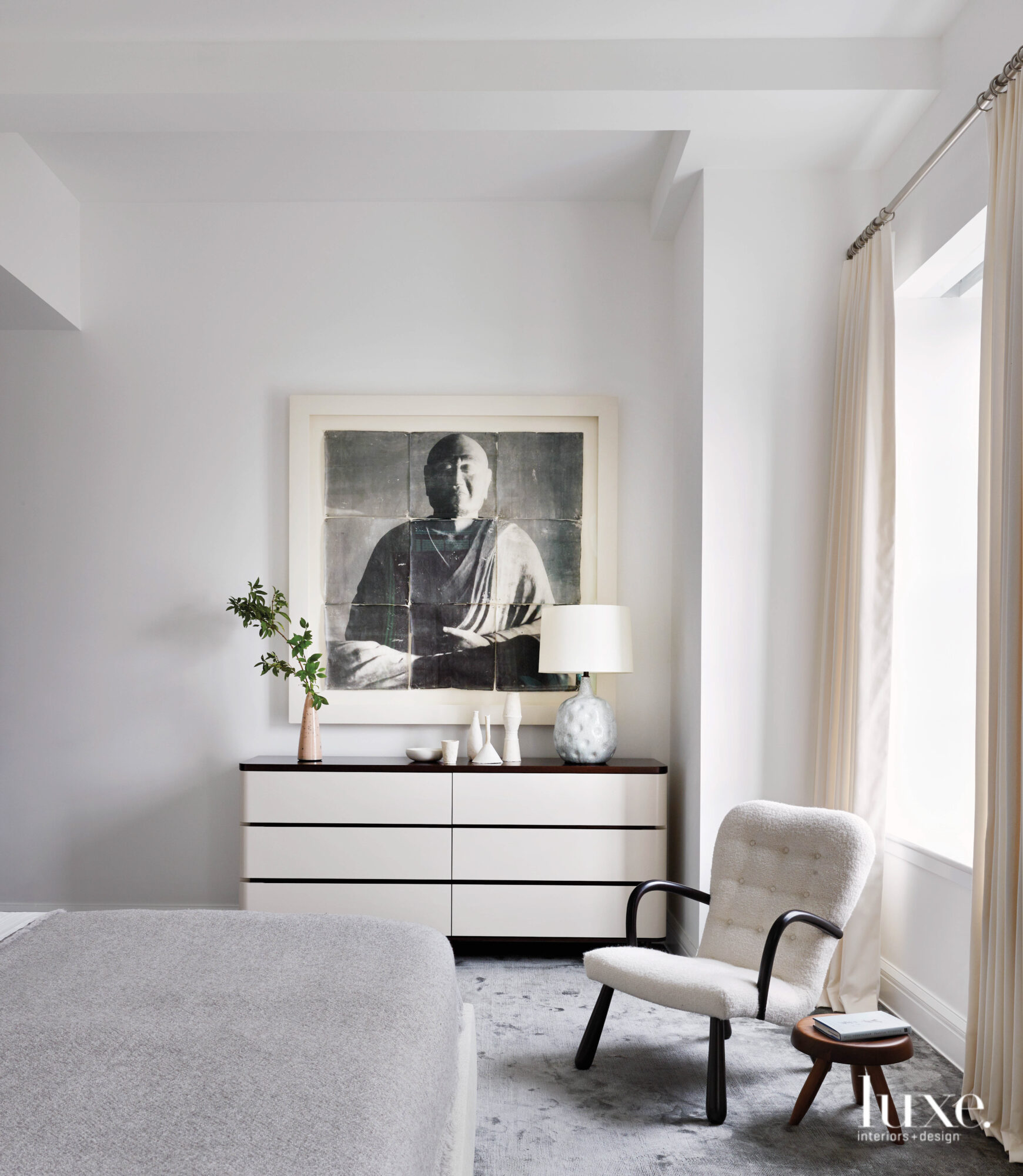 An all-white master zen bedroom promotes a minimalist style