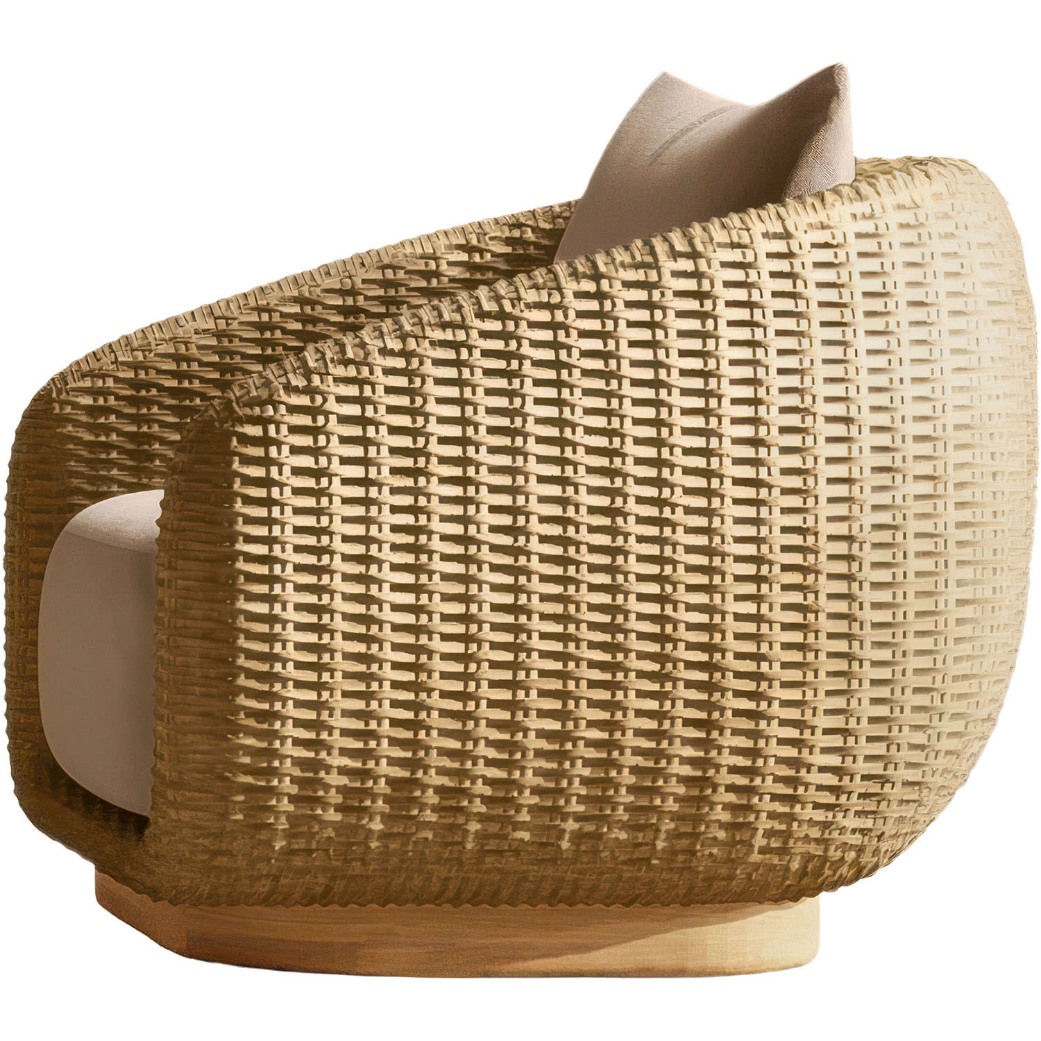 A side view of a cozy wicker armchair with a curved design, featuring beige cushions. The chair's warm tones suggest comfort and relaxation.