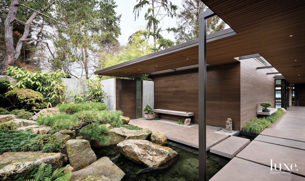 outdoor walkway next to peaceful zen garden in wellness room