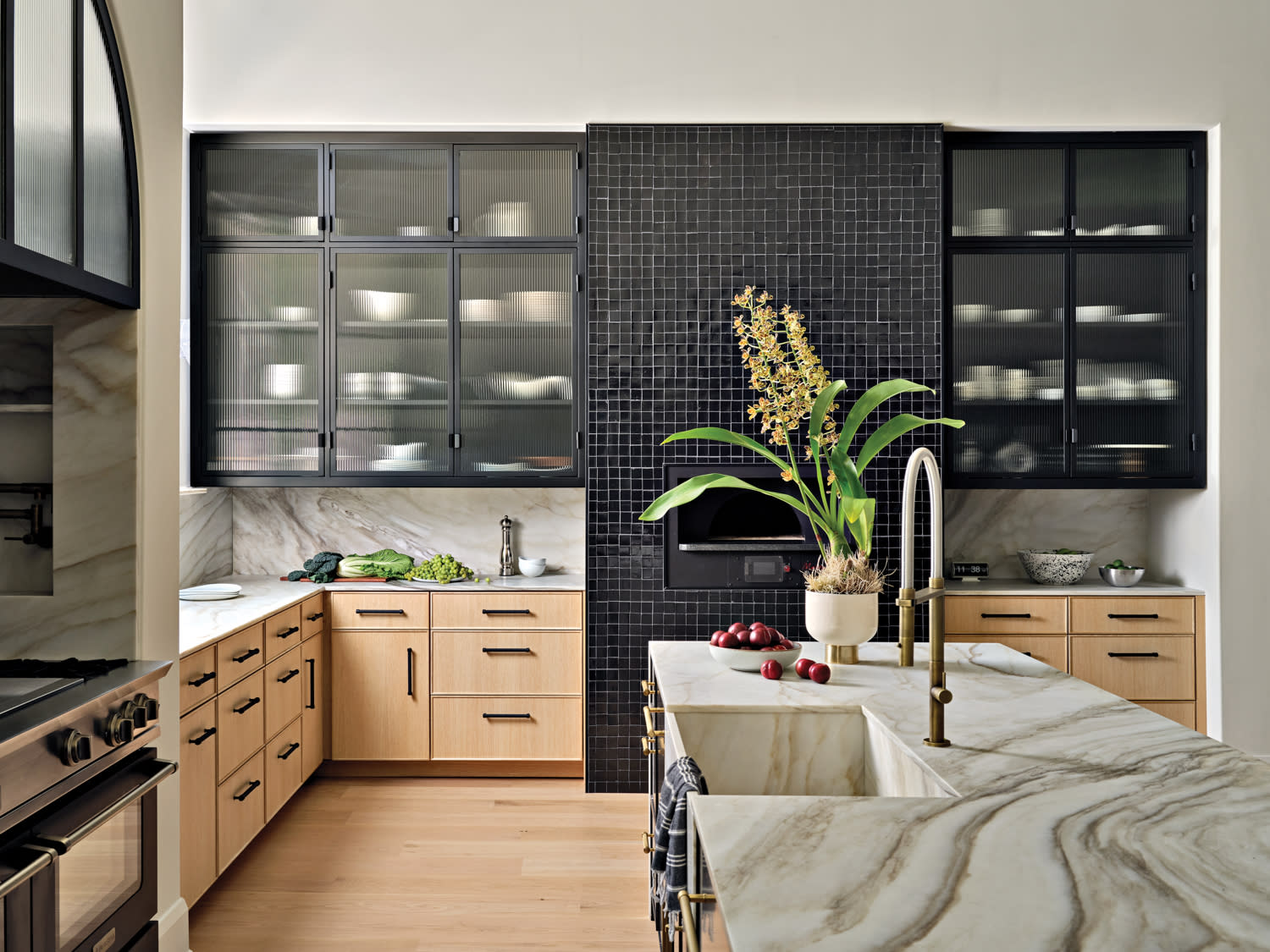 modern kitchen with white oak flooring and matching lower cabinetry