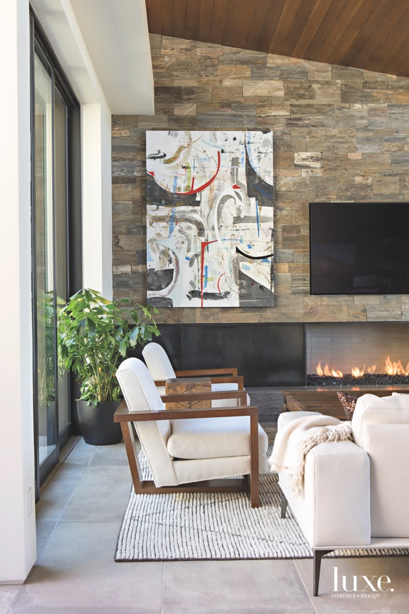 modern living room fireplace artwork hillside