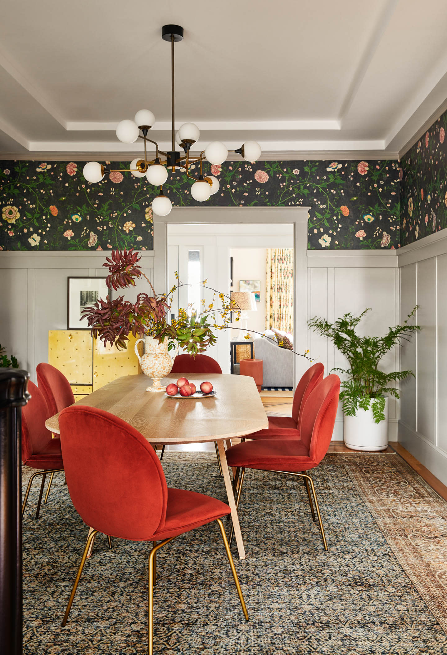 modern San Francisco dining room with floral wallcovering lining the top of the room