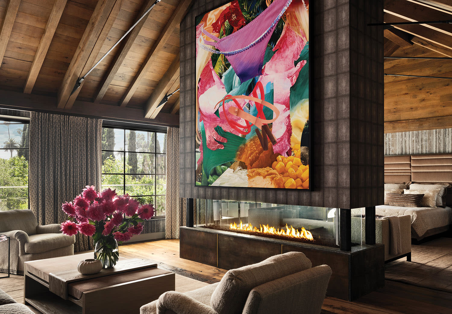 a floating fireplace wrapped in a Harsey & Harsey faux shagreen acts a bedroom divider