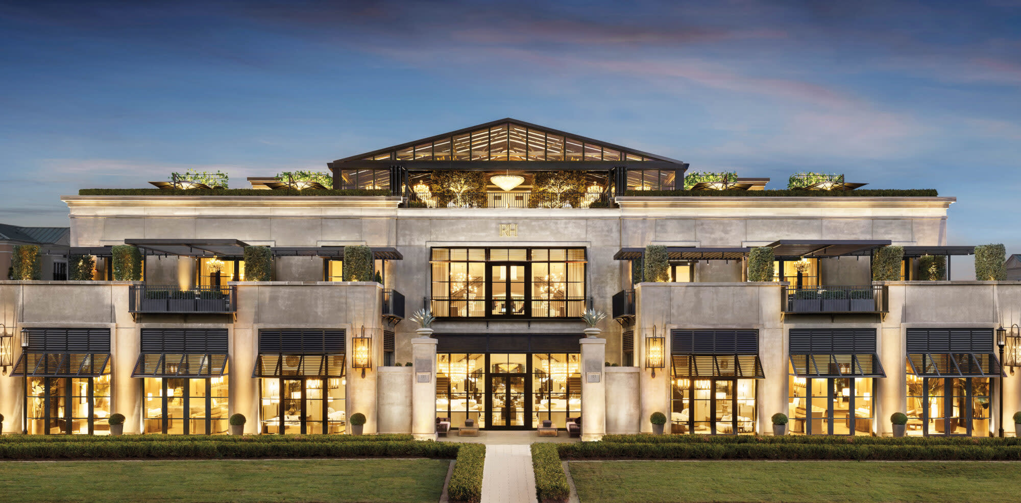 Large three-story building with bright windows