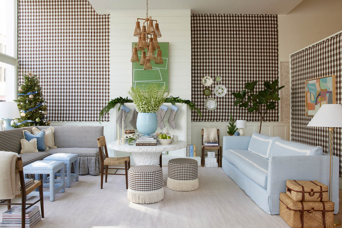 brown and white gingham lines the walls of a holiday vignette