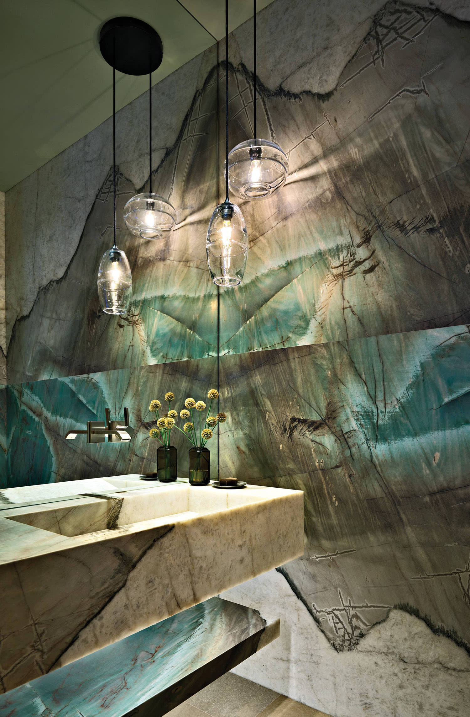modern powder room with Botanic Wave quartzite walls and vanity