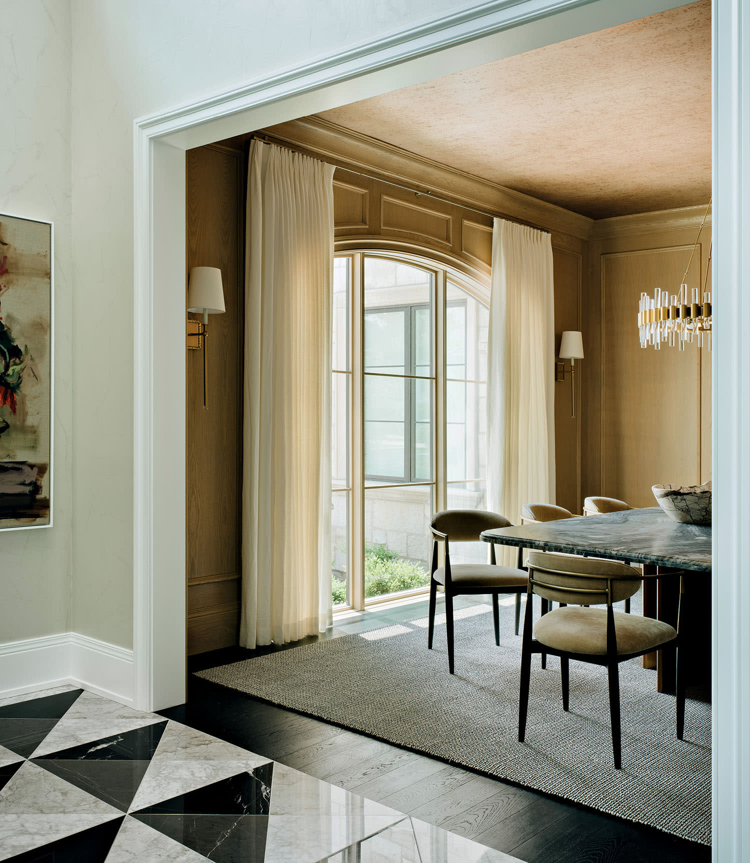dining room with a metallic wallcovering on the ceiling