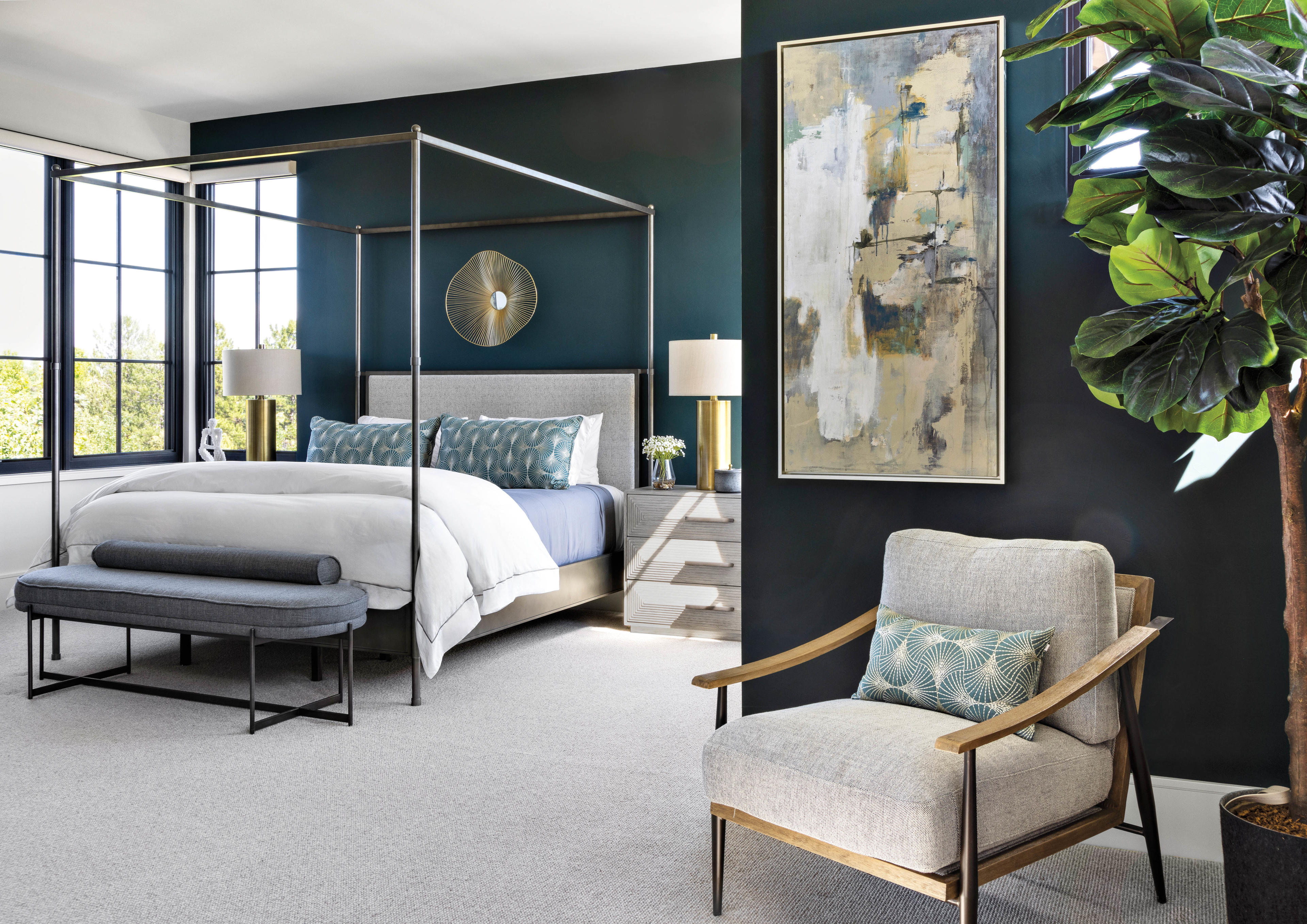 deep blue-green living room with a four-poster bed