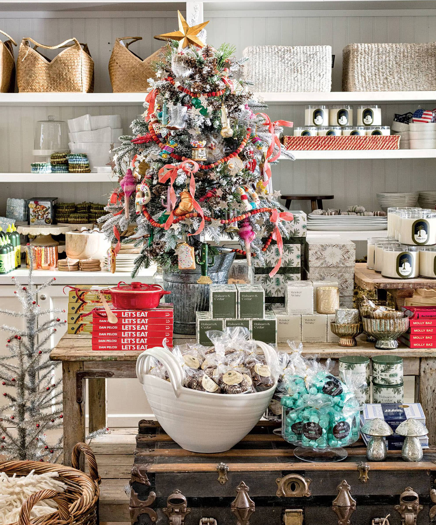 A shop decorated for the holidays and stocked with books and other trinkets to buy