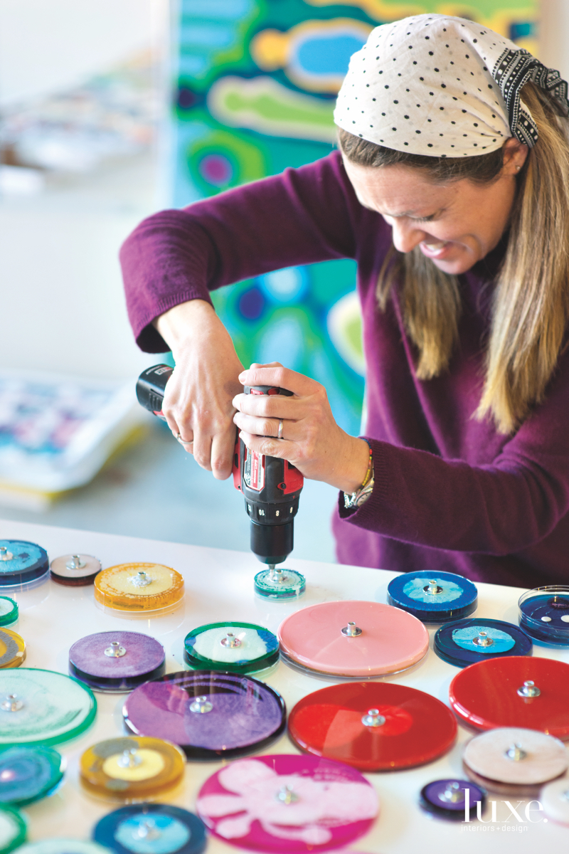 Reis, creating mounting hardware for her petri dishes, also uses epoxy polymer in her large-scale pieces.