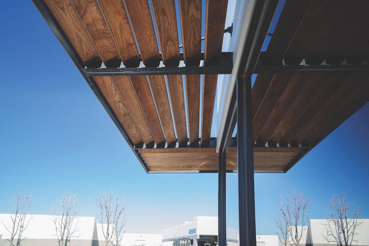 A structure with a wooden roof, highlighting its unique architectural features and design elements.