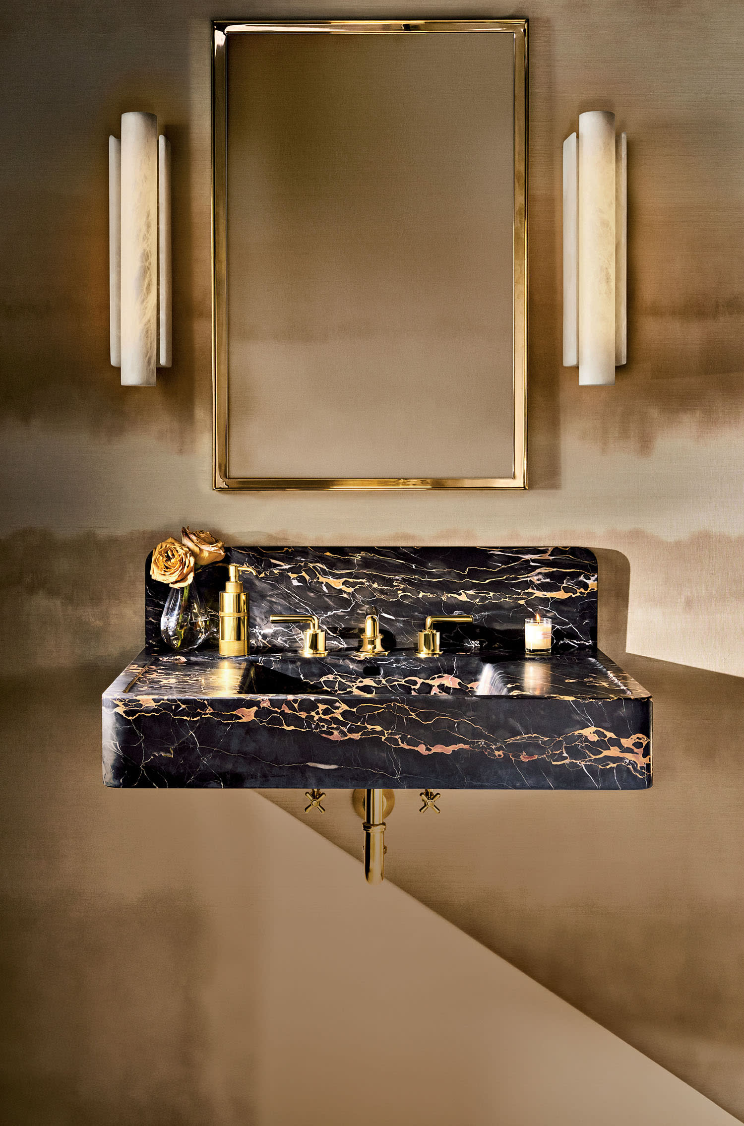 Waterworks’ Carlo Wall Mounted Lavatory Sink in a rich Portoro marble