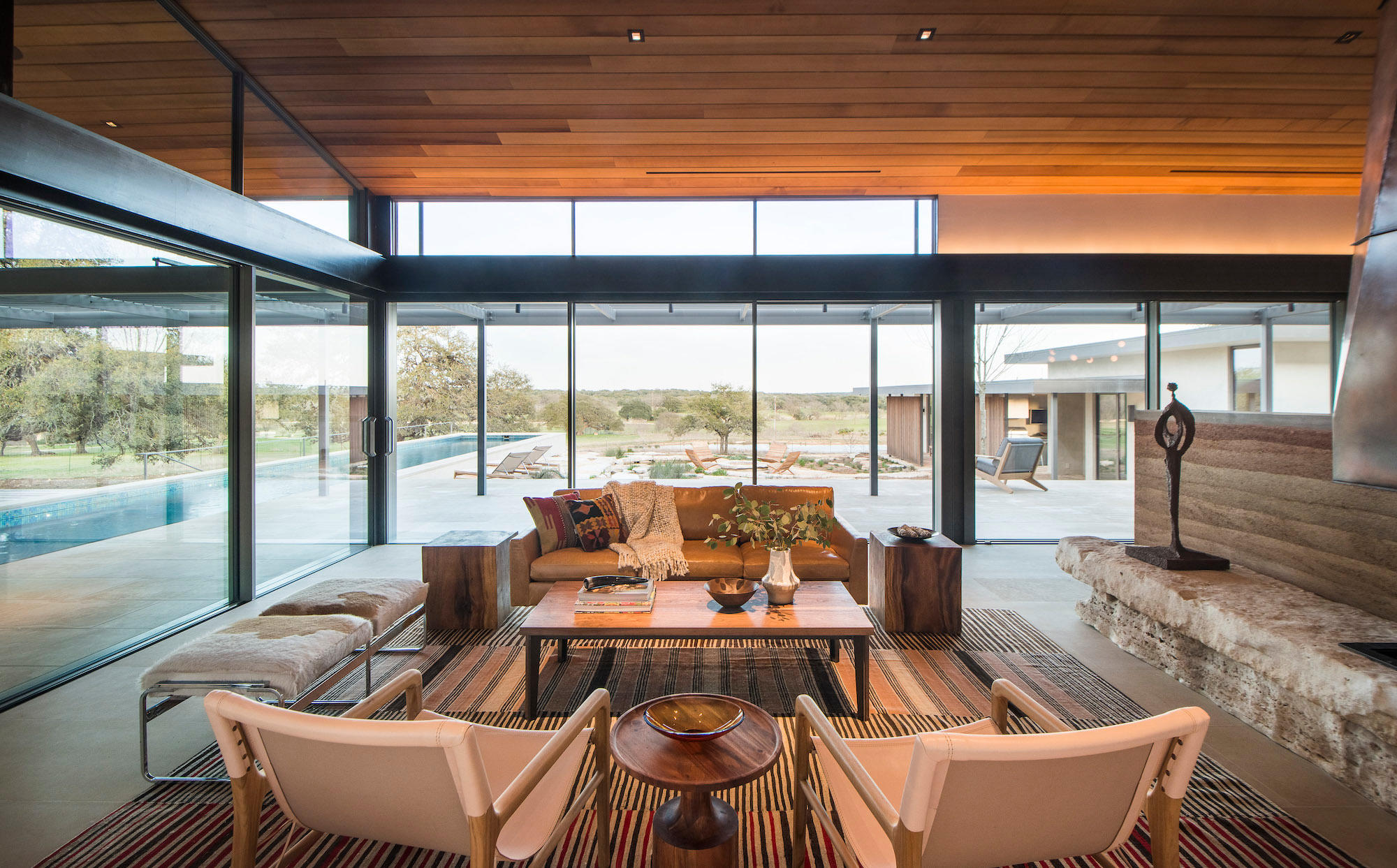 Living room with wall to floor windows.