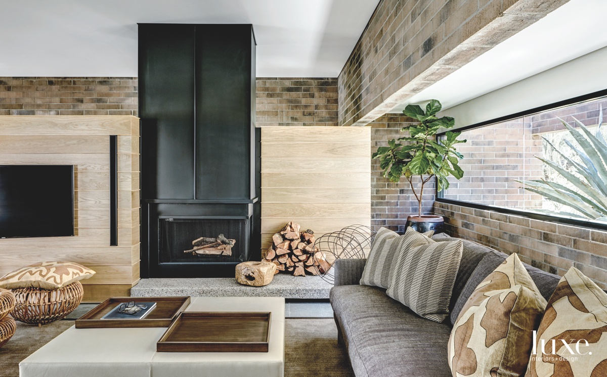 contemporary living room wood plank clad fireplace fabricated concrete blocks