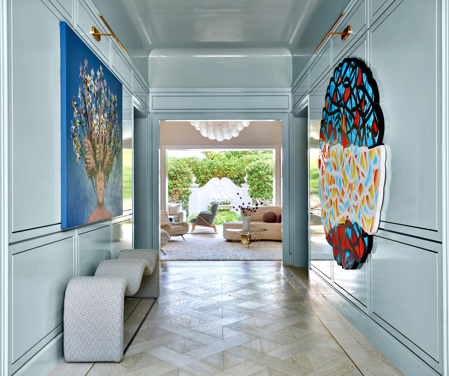 blue foyer of a Regency-style Palm Beach home