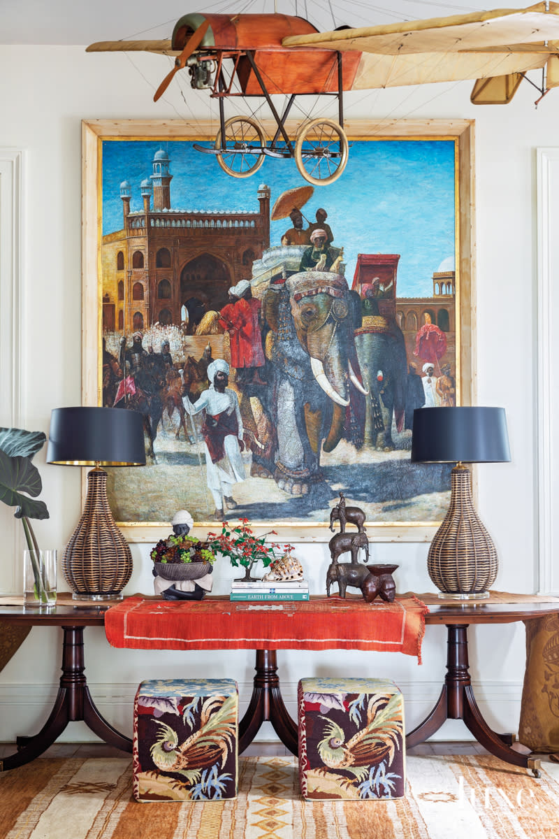 study with mahogany console with vintage wicker lamps