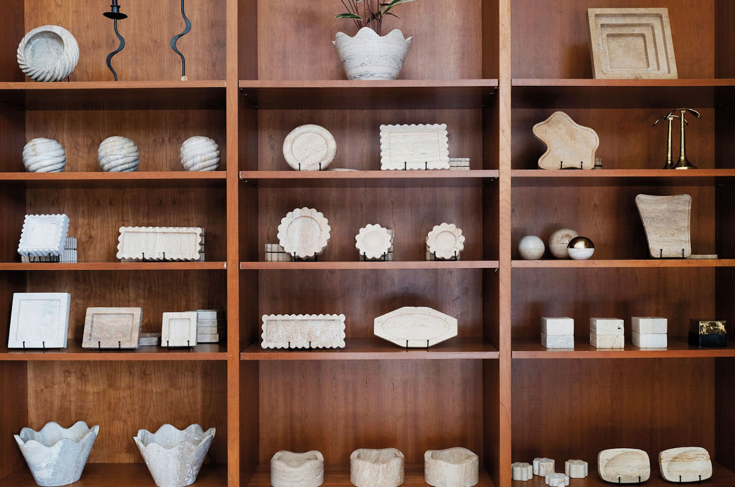 shelves with vintage wares on display at Anastasio Home