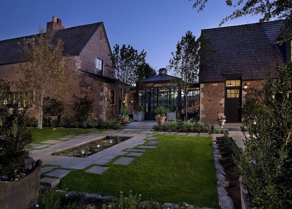 Glass walkway that connects the two sides of the home together