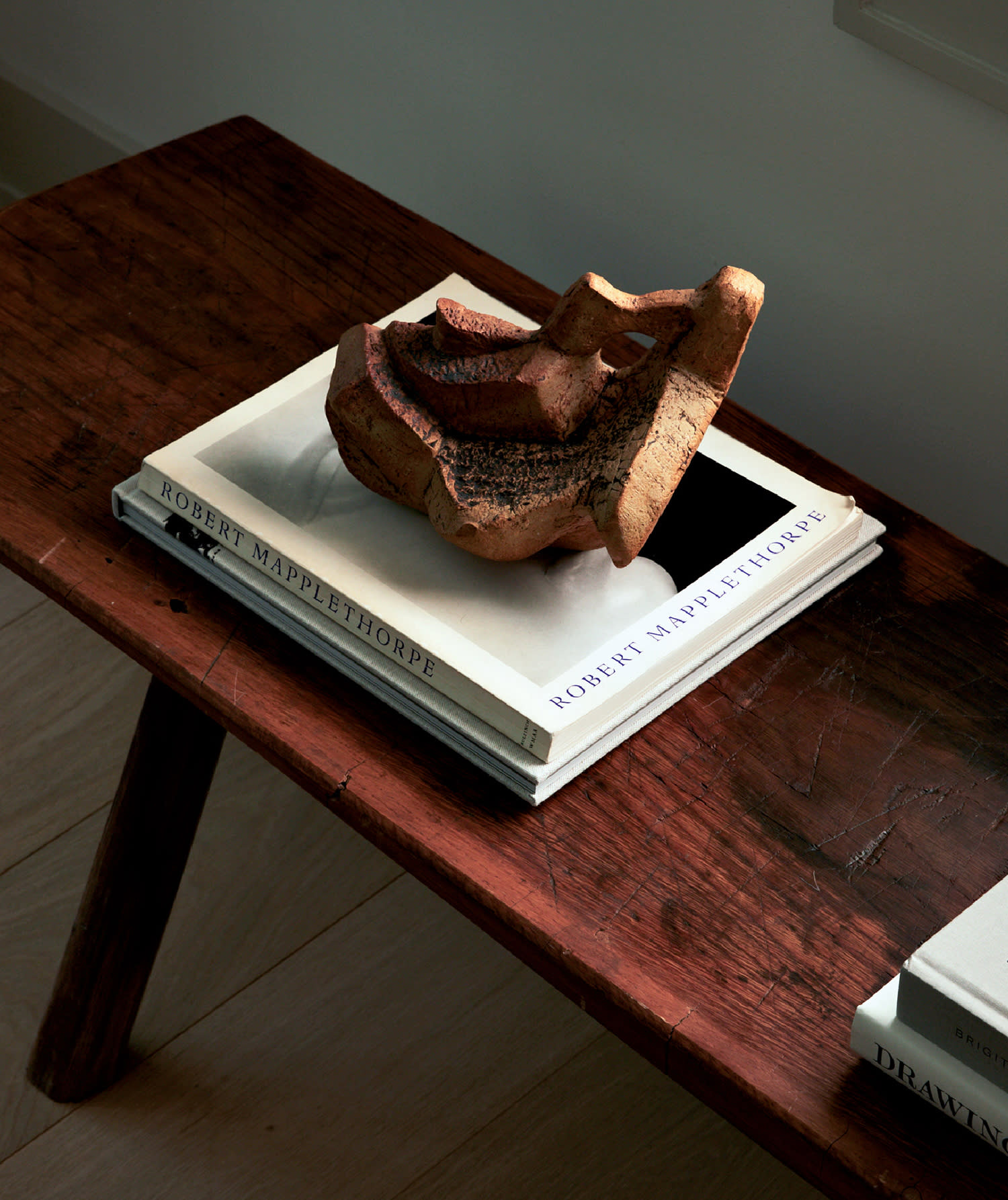 wood sculpture atop a bench
