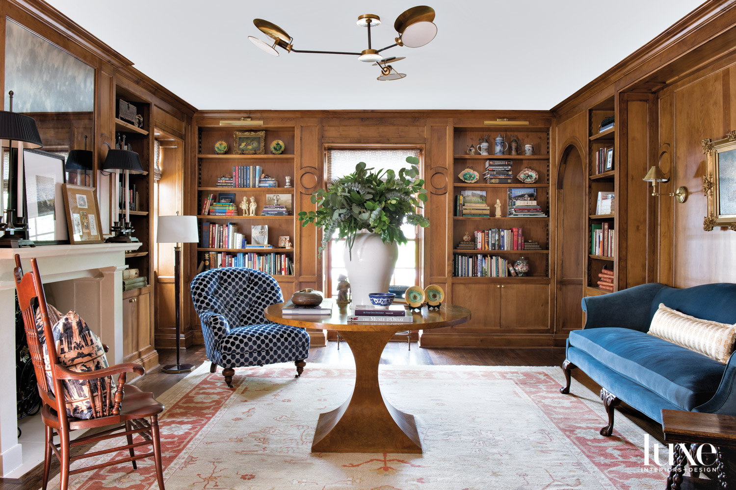 Living room with dark wood paneling