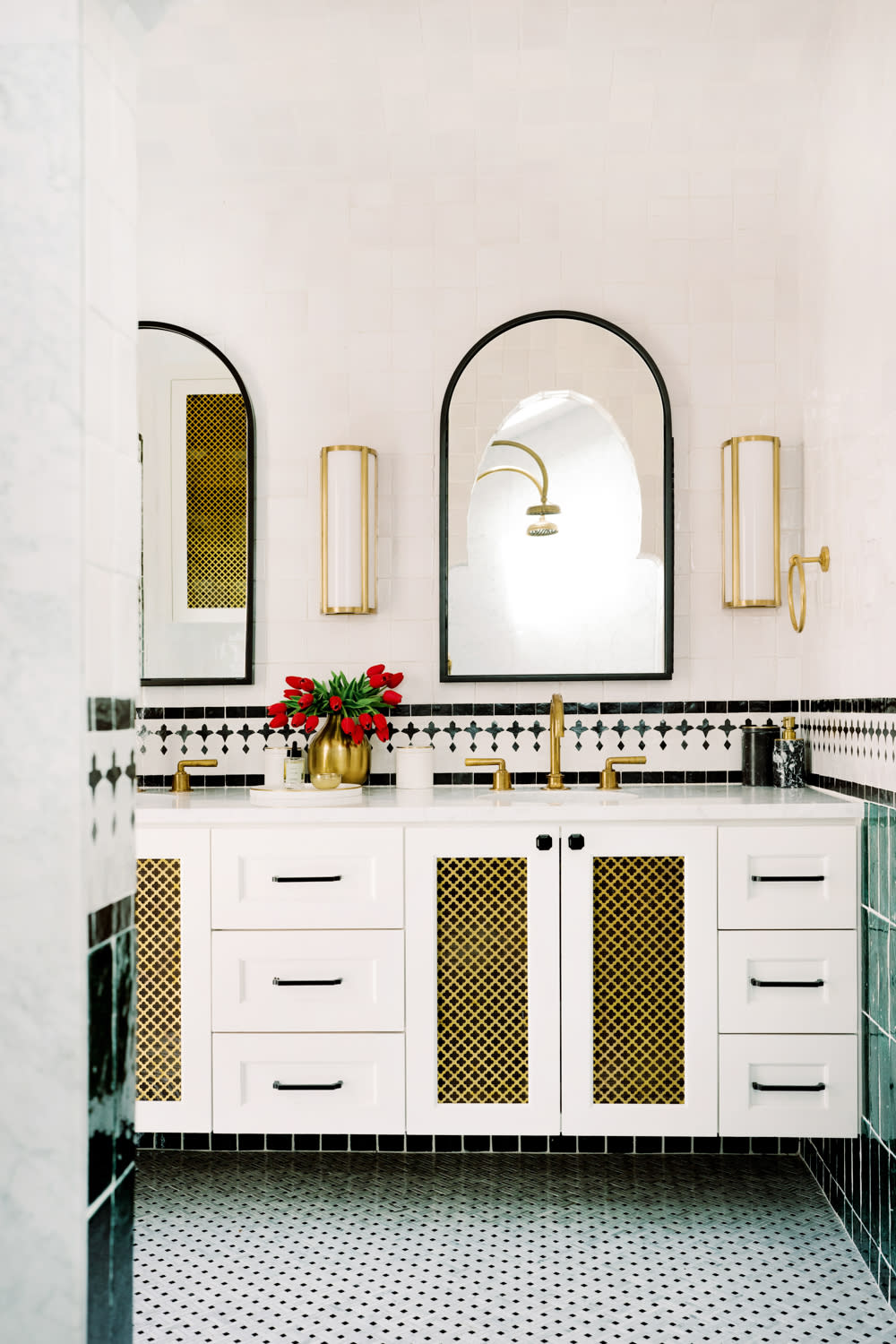 Mediterranean-inspired bathroom with brass finishes 