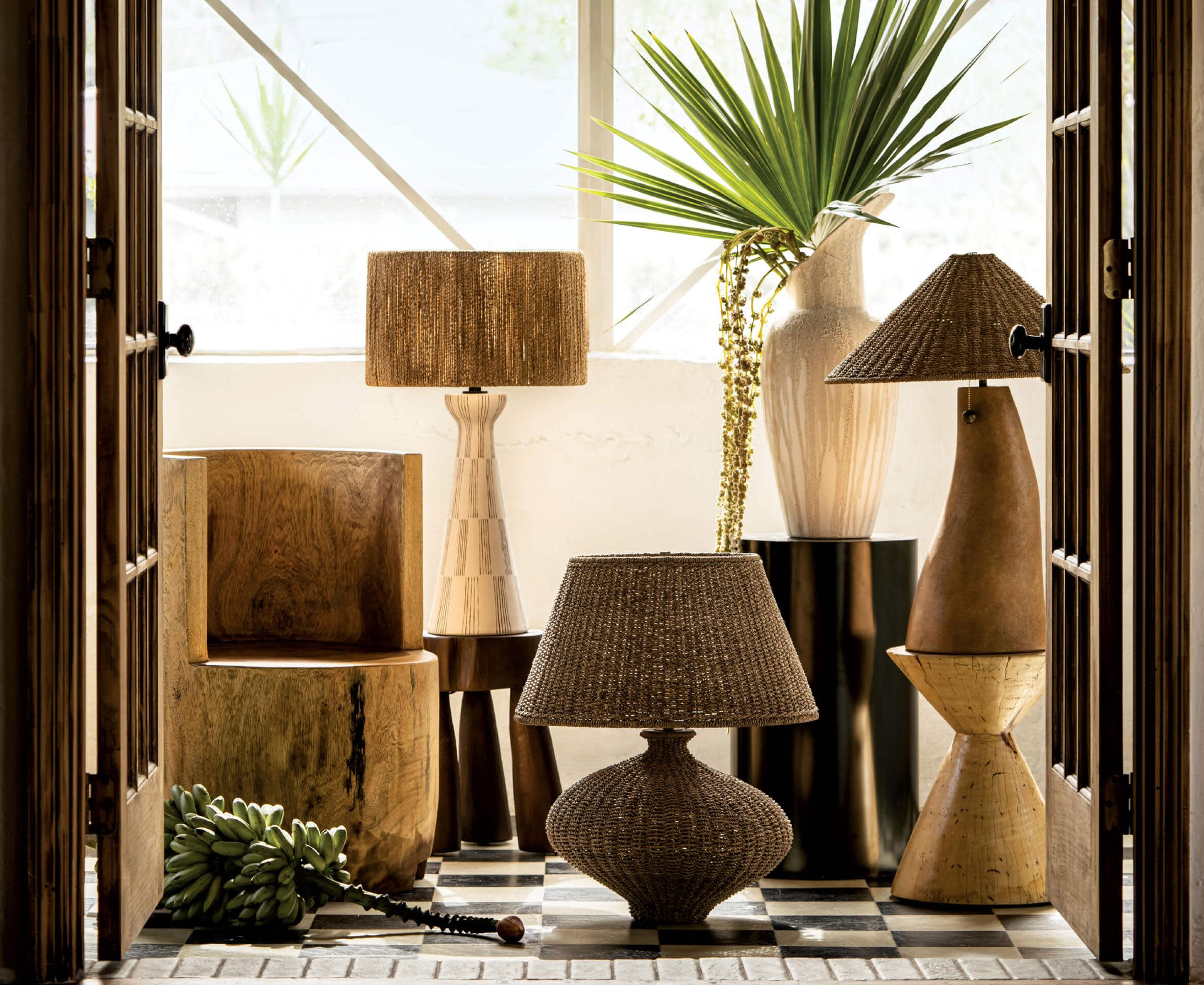 a collection of lamps in neutral colors and natural materials