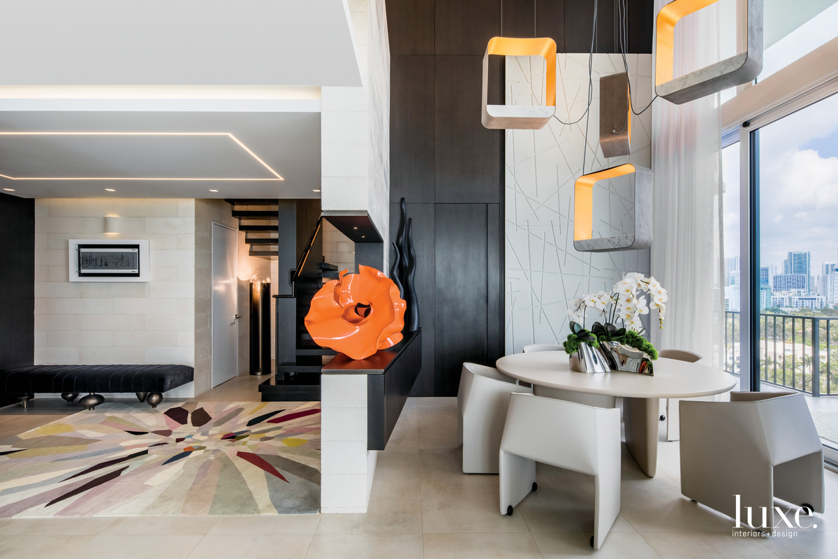 contemporary foyer and dining room neutral palette with a few pops of color brickell