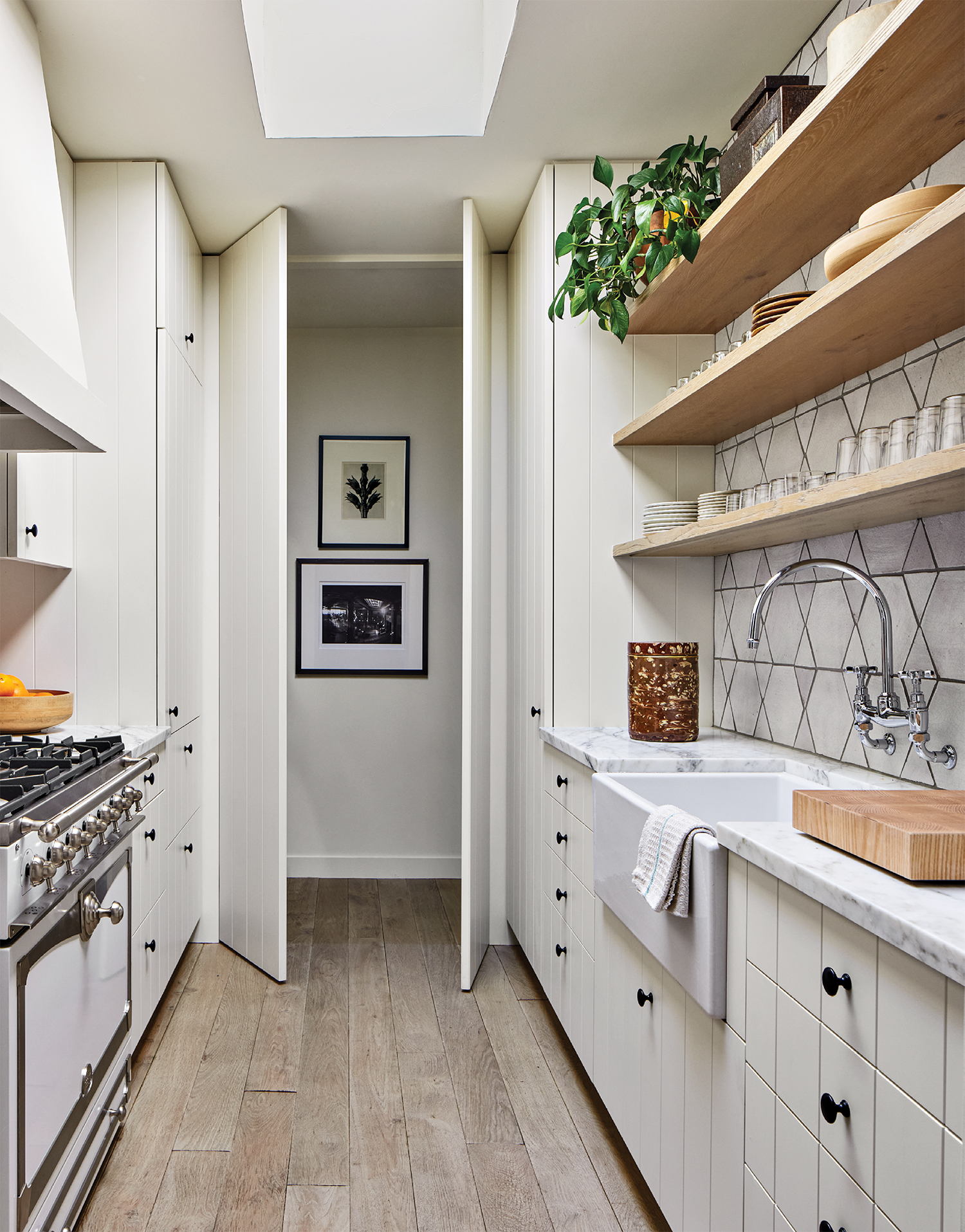 white kitchen with open shelving 
