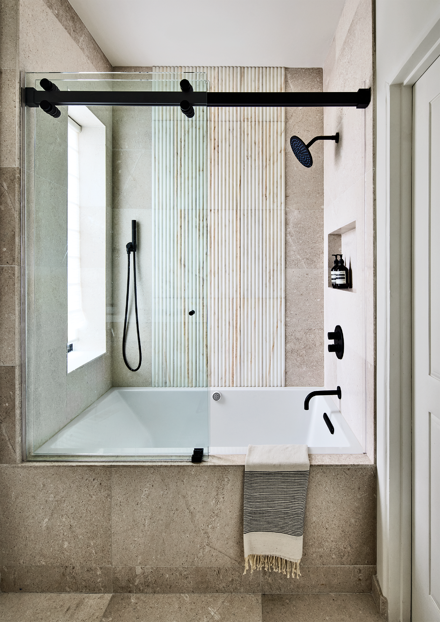 stone surrounded soaking tub in an Arizona home