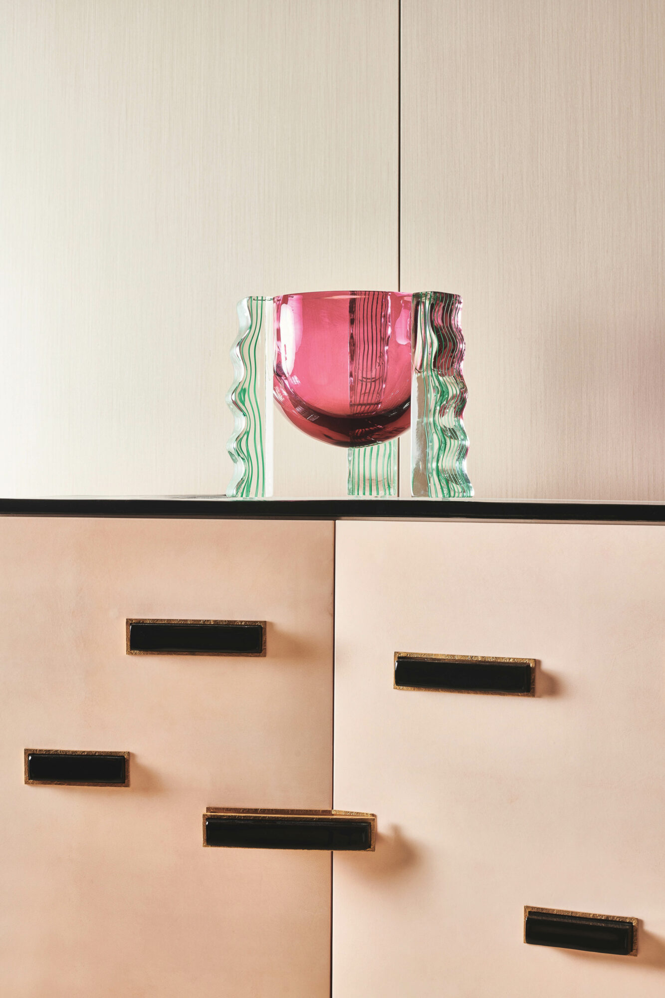 Abstract pink-and-green glass vase shown in Achille Salvagni Atelier, part of the New York art scene