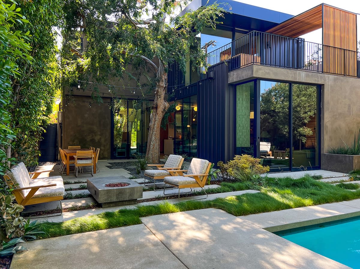 A stylish home showcasing a pool and a patio, perfect for enjoying outdoor living and entertaining