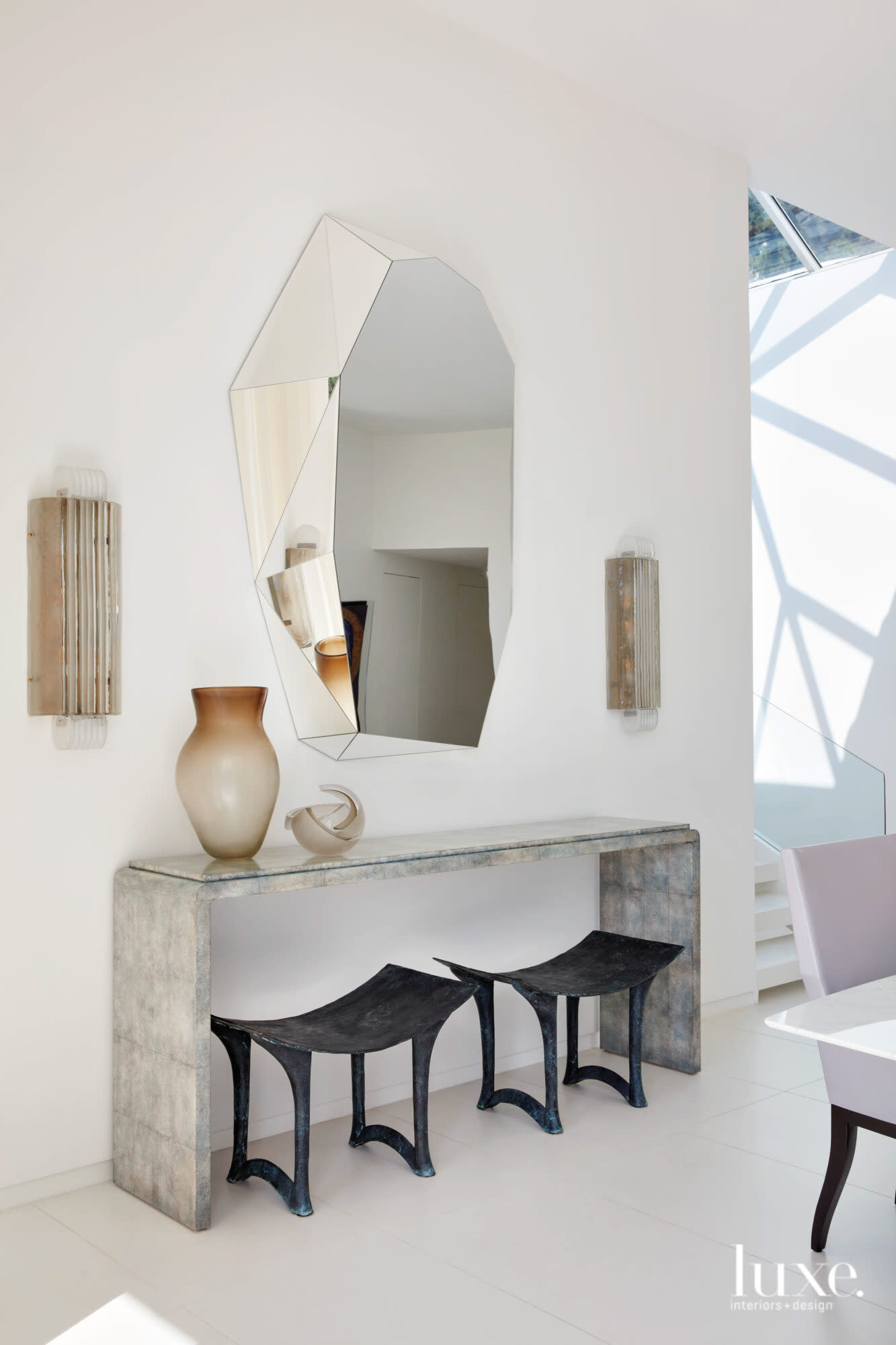 Detail shot with stools, console and mirror