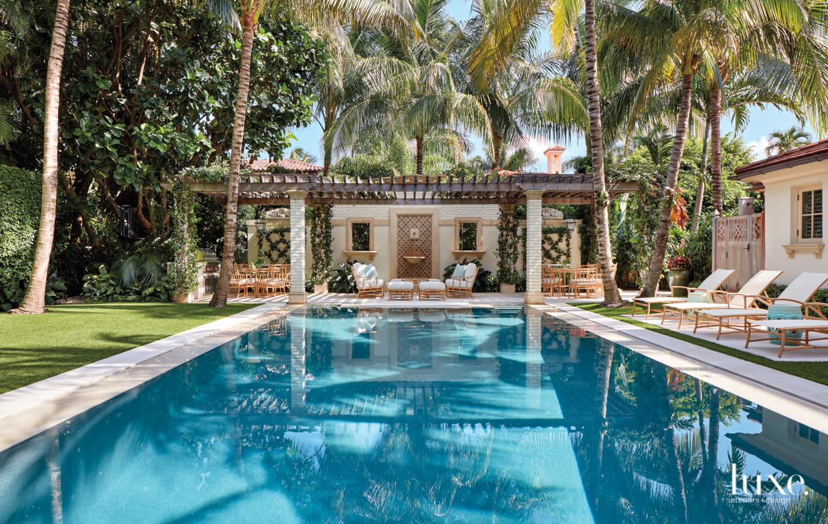 palm beach pool house and pool with lounge seating