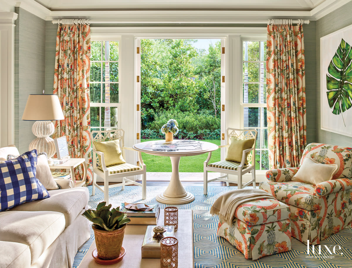 coral patterned draperies and chaise