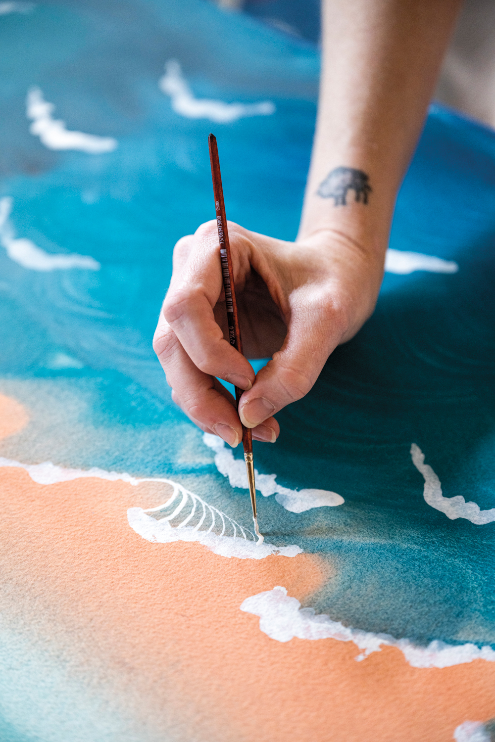 artist brianna lance painting waves