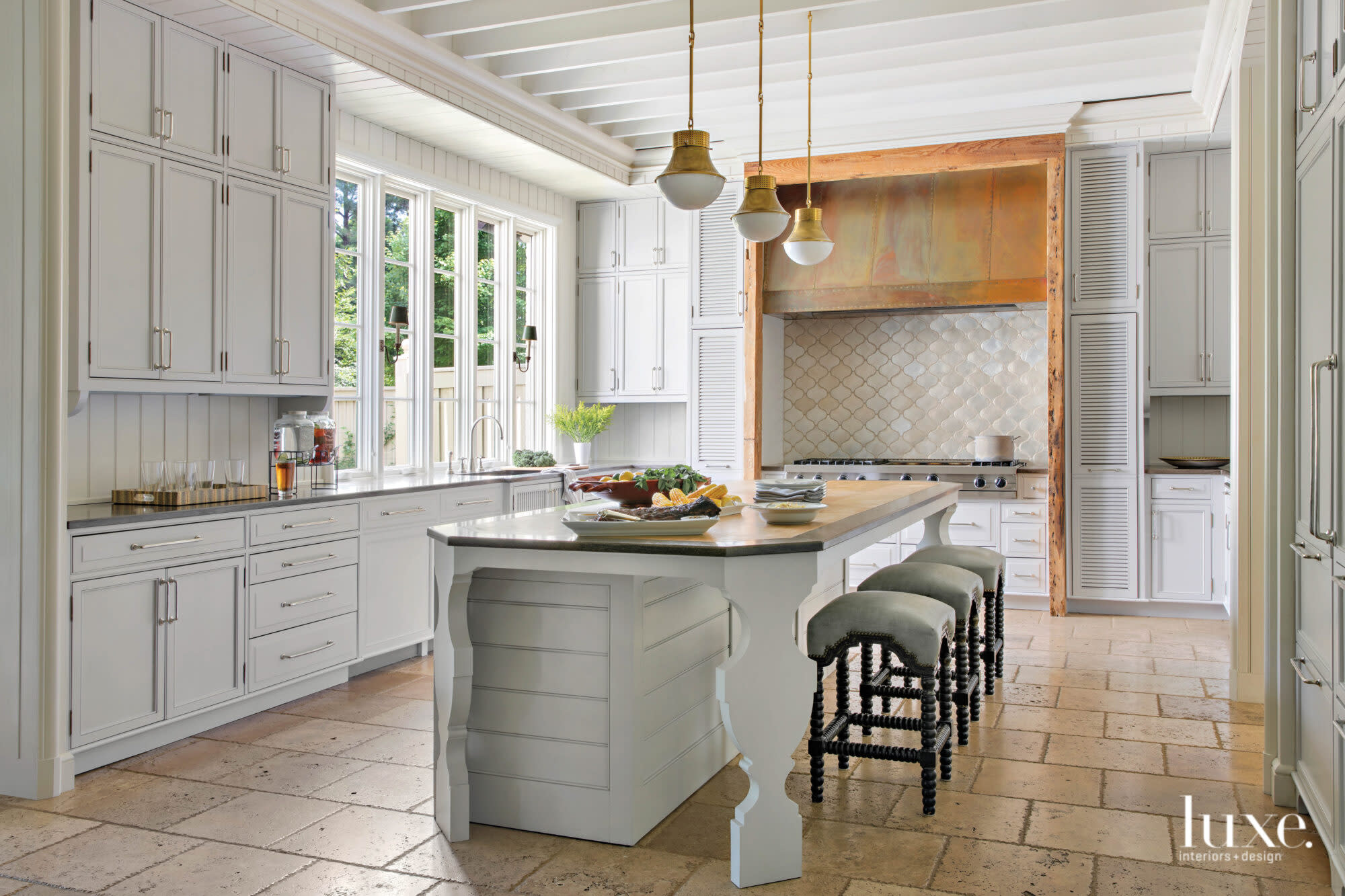White kitchen with patinated details