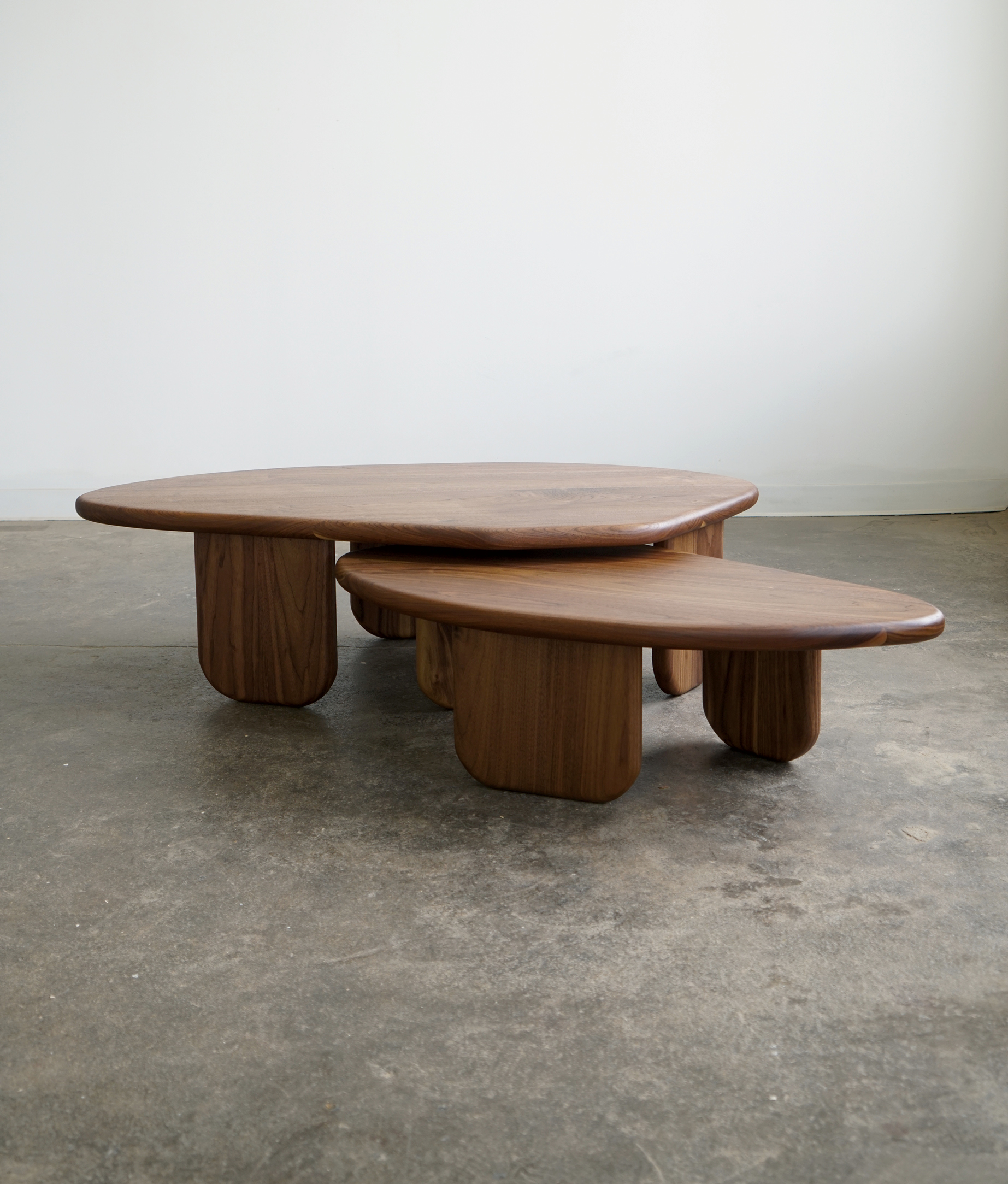 two nested wood coffee tables