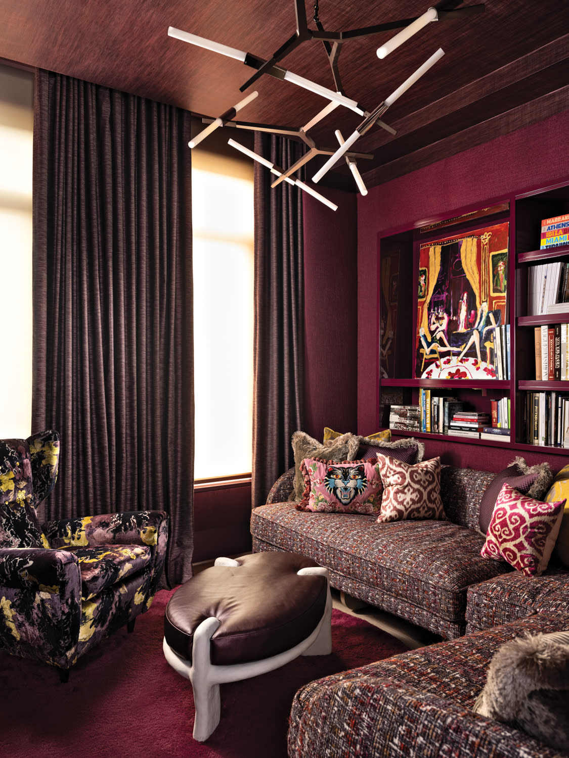 modern, luxurious red media room in a contemporary New York City apartment