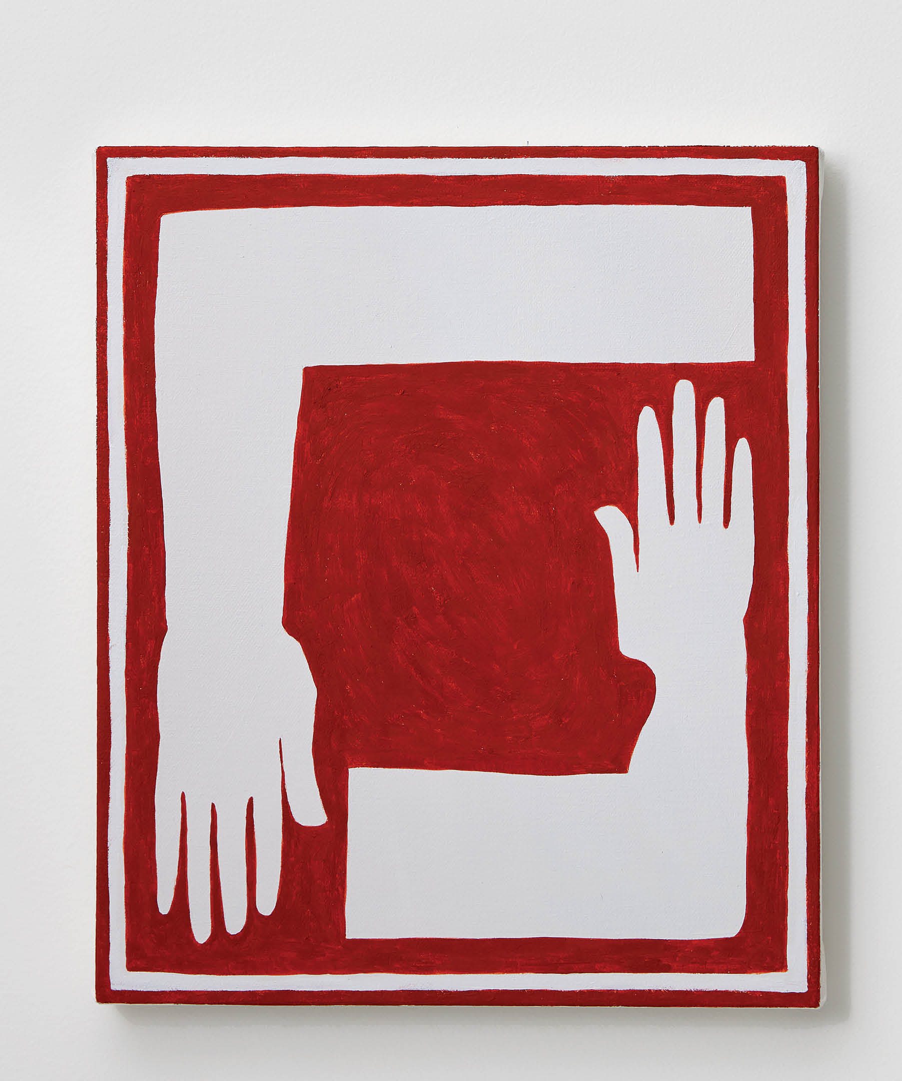 white hands making right angles on a red background