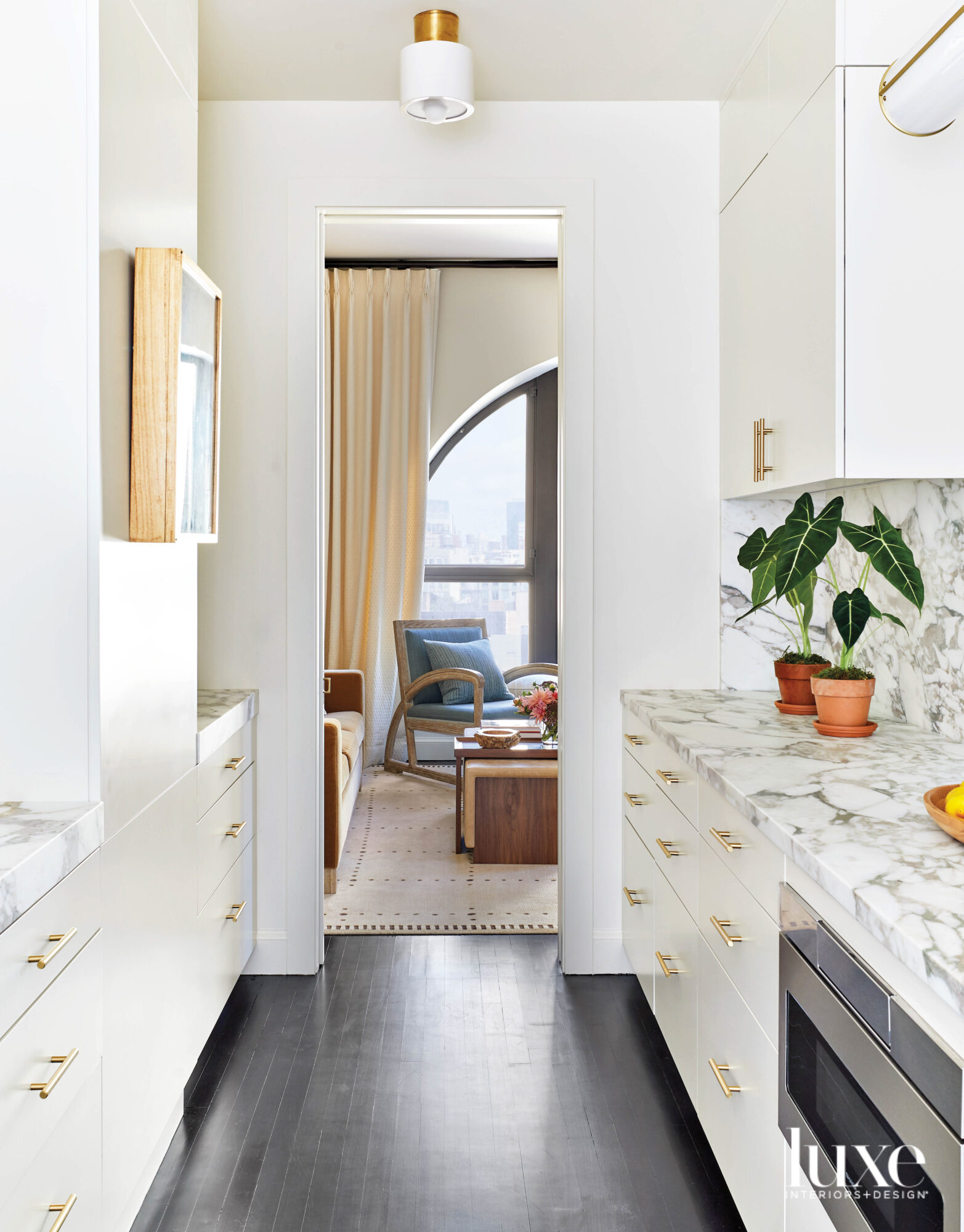 white kitchen with satin brass hardware