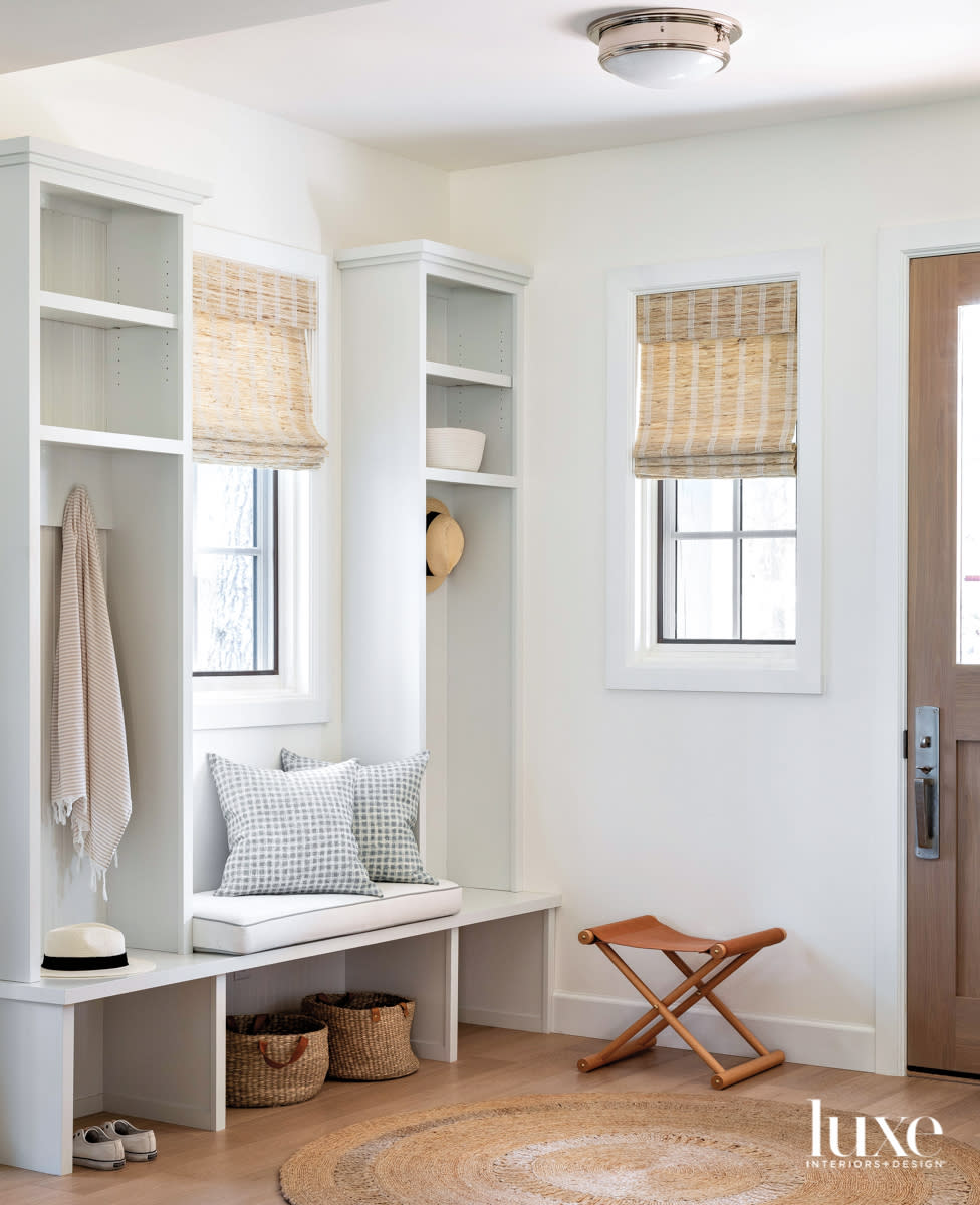 Mudroom entry with built in cabinets for storage