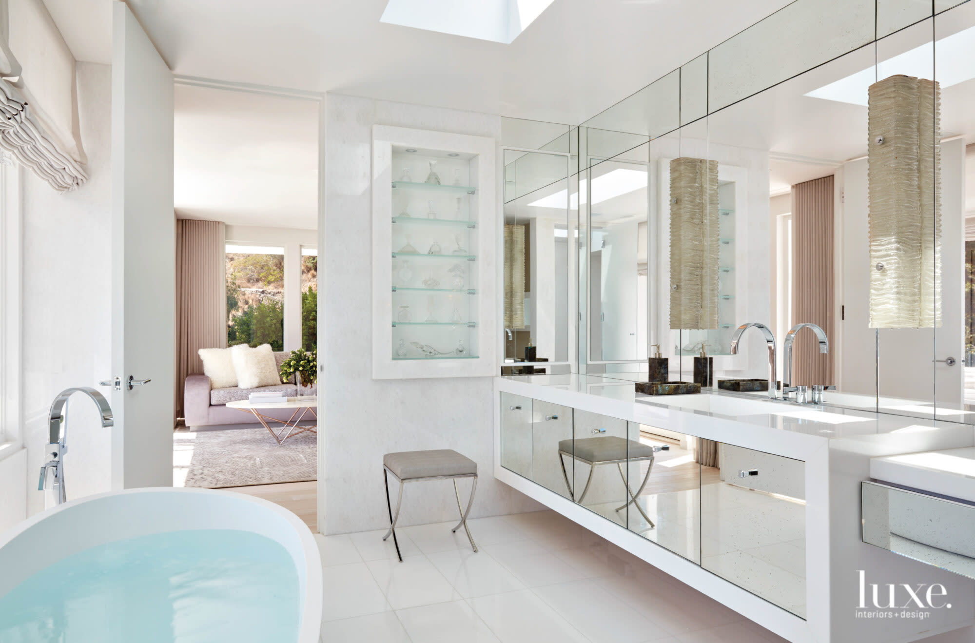 Master bath with partial view of the tub
