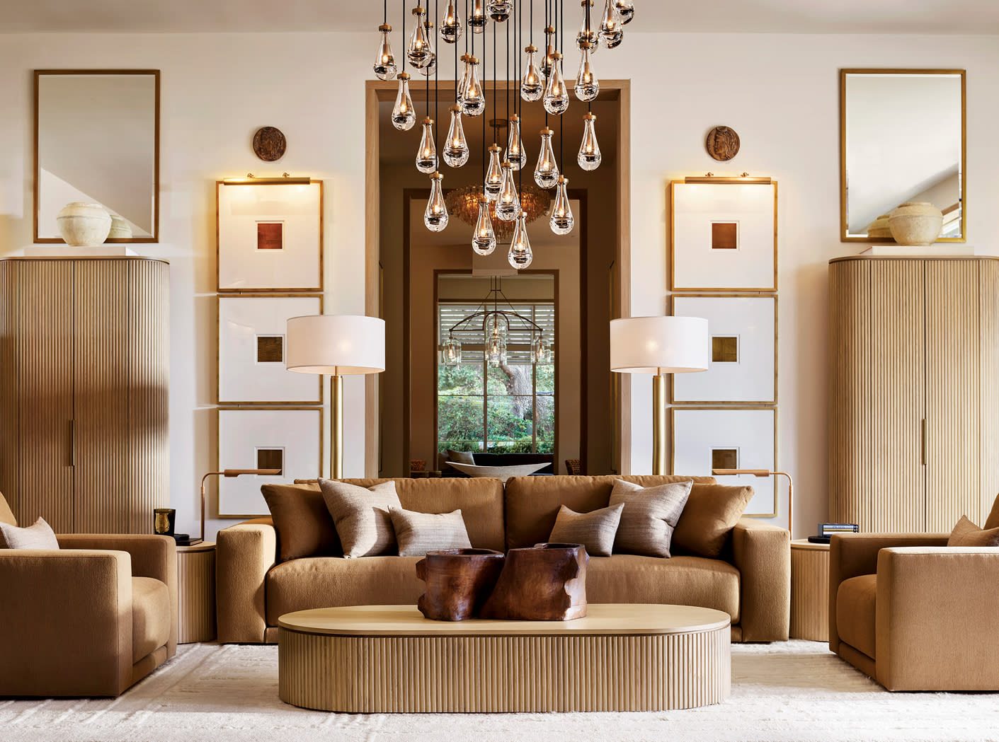 water-drop chandelier above a seating area at RH Palo Alto, The Gallery at Stanford